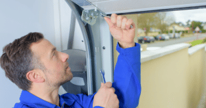 Man repairs door